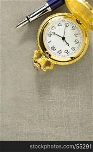 old pocket watch at old background
