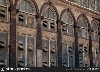 old power plant - windows and brick walls wirh sandstone decoration