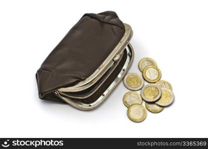 Old purse and euro coins closeup on white background