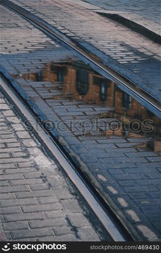 old raildroad tracks in the street in the station