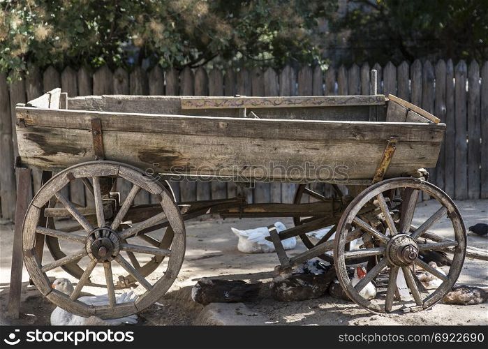old rarity wooden cart for a horse, a summer day