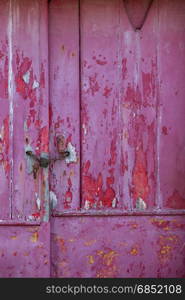 old raspberry colorer door with damaged texture
