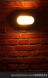 Old red brick wall with street light background