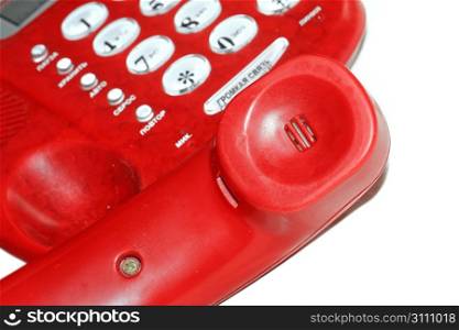 old red telephone on white background