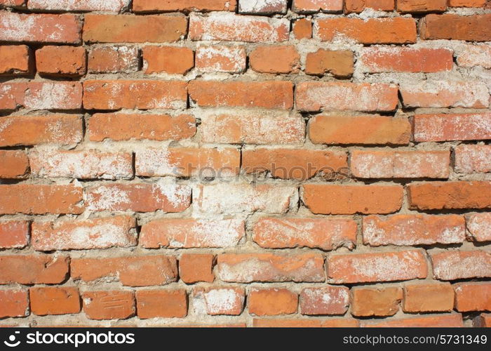 Old red with hollows a brick wall of the house a structure