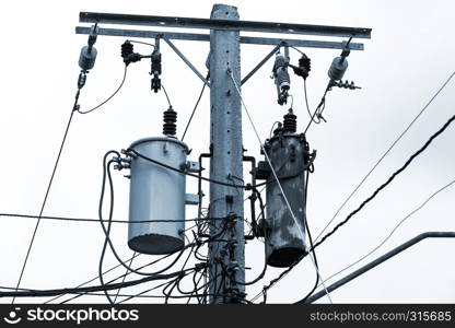 old reinforced concrete pole with electrical wires