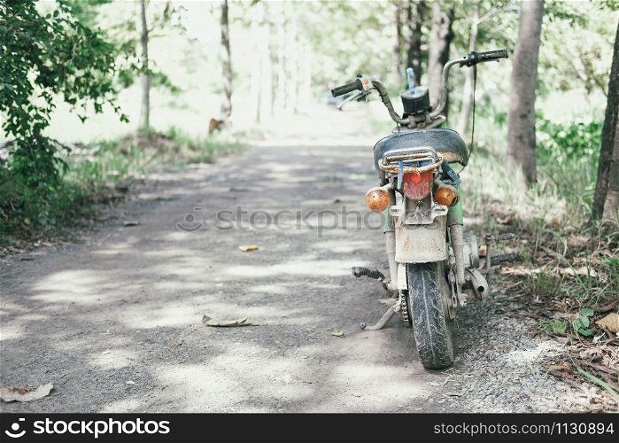old retro motorcycle motorbike parked in garden