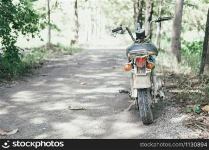 old retro motorcycle motorbike parked in garden