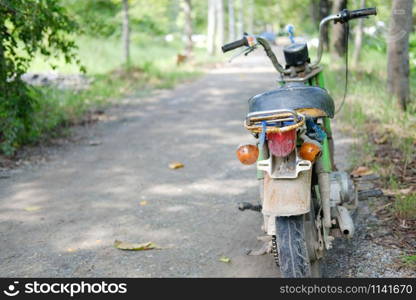 old retro motorcycle motorbike parked in garden