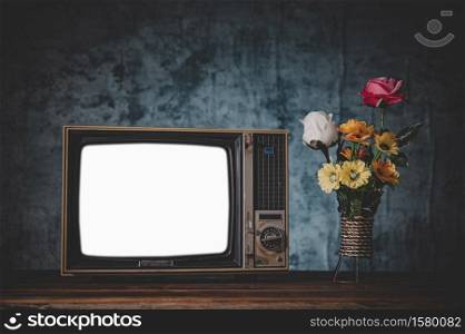 Old retro TV It&rsquo;s still life with flower vases.