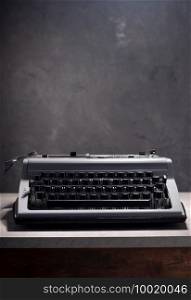 old retro typewriter at wooden table, creative writer concept