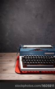 old retro typewriter at wooden table, creative writer concept
