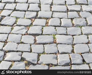 Old road paved with granite stones