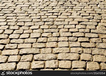 Old road paved with the cobble stones