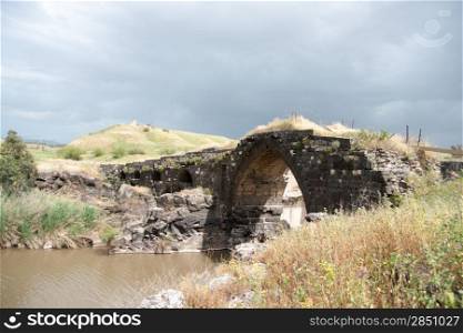 Old roman bridge over Jordan river