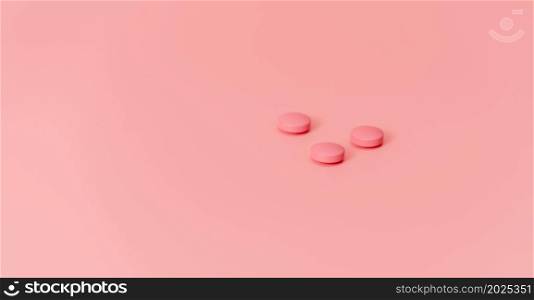 Old rose round tablet pills on old rose background. Pharmaceutical industry. Healthcare and medicine. Prescription drug. Online pharmacy banner. New drug research and development concept. Sample drug.