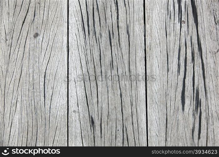 old rough textured grey wooden planks with cracks