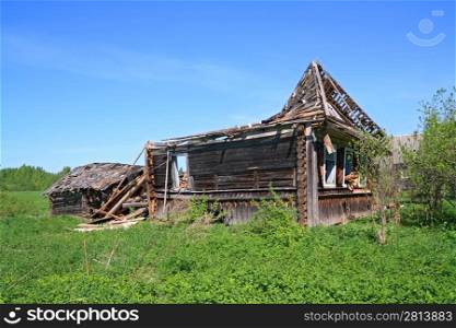old ruined wooden rural house