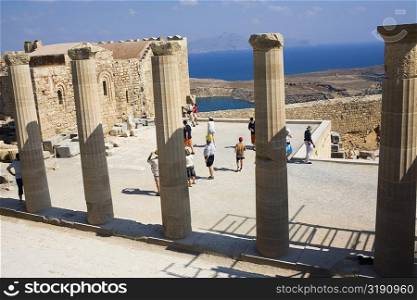 Old ruins of a temple, Temple Of Athena Lindia, Acropolis, Lindos, Rhodes, Dodecanese Islands, Greece