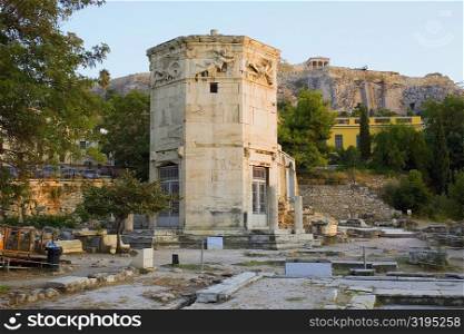 Old ruins of a tower, Tower Of The Winds, Roman Agora, Athens, Greece