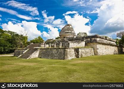 Old ruins of an observatory on an landscape, Chichen Itza, Yucatan, Mexico