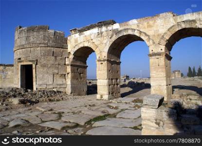 Old ruins of gate Hierapolis near Pamukkale, Turkey