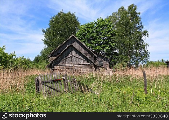 old rural house amongst tree