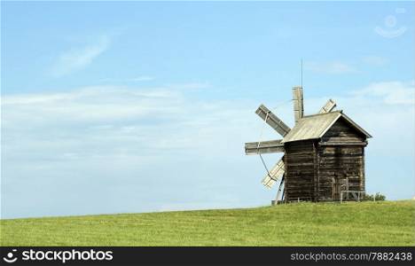 Old Russian windmill in a field, a wonderful rustic look, the background.