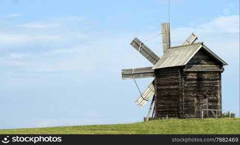 Old Russian windmill in a field, a wonderful rustic look, the background.