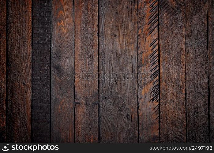 Old rustic dark wooden planks table texture background flat lay top view