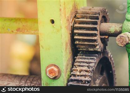 Old rusty axle shaft of sugarcane juice machine manual