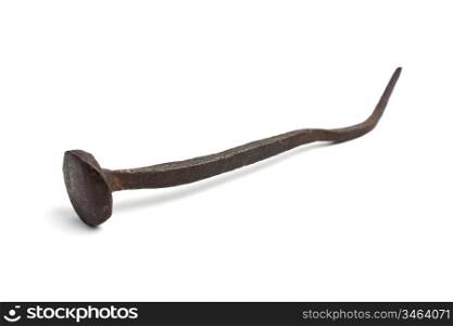 old rusty iron nail isolated on a white background