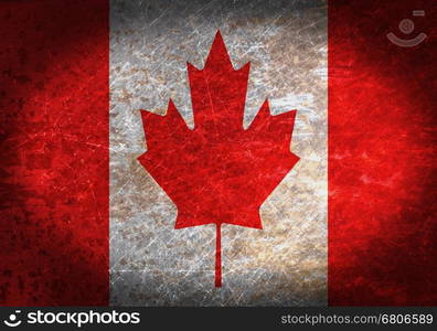 Old rusty metal sign with a flag - Canada