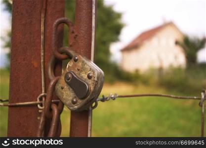 Old Rusty Padlock on Country Gate
