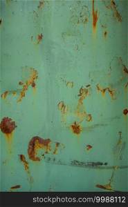 old rusty painted metal wall. wallpaper background. old rusty painted metal wall