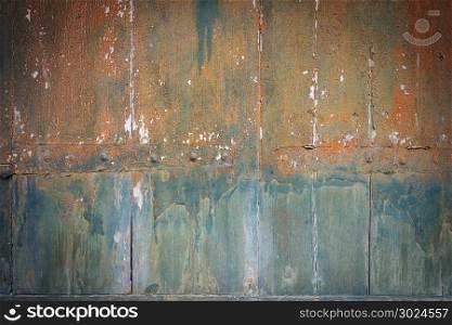 Old rusty painted wood board background texture. Old rusty painted wood board