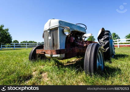 Old Rusty Tractor in a Field