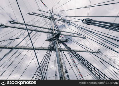 Old sailing ship mast. Tall ship rigging detail. Masts and rigging of a sailing ship