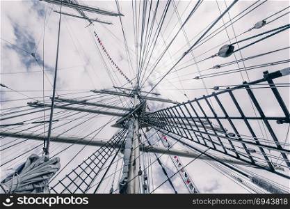 Old sailing ship mast. Tall ship rigging detail. Masts and rigging of a sailing ship