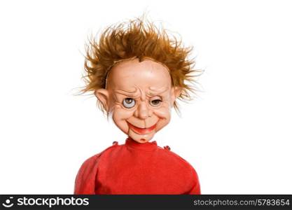 old scary male doll in a studio picture