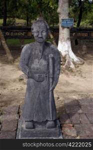Old sculpture on the ground of royal tomb near Hue, Vietnam