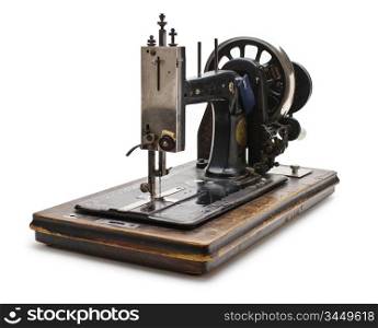 Old sewing machine isolated on a white background
