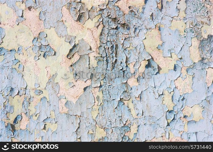 Old shabby surface with a bare paint on metal