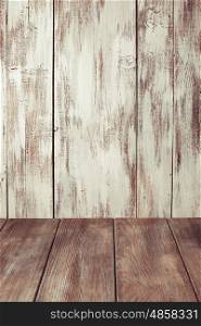 Old shabby white wooden wall and gray floor for design. Old shabby wooden wall