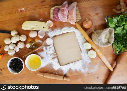 old sheet and flour on wooden background&#xA;