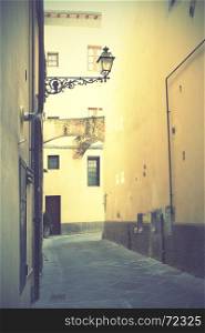 Old side street in Pistoia, Italy. Retro style filtred image