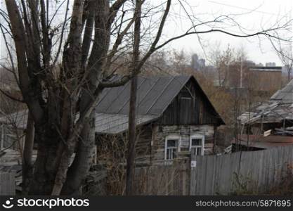 Old slums and Abandoned wooden houses on town outskirt 1332. Old wooden houses 1332