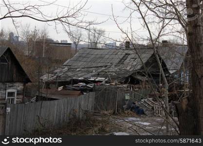 Old slums and Abandoned wooden houses on town outskirt 1333. Old wooden houses 1333