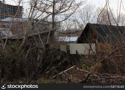 Old slums and Abandoned wooden houses on town outskirt 1335. Old wooden houses 1335