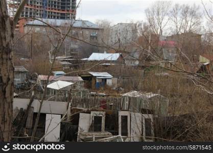 Old slums with wooden houses on town outskirt 1338. Old town slums 1338